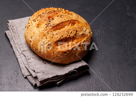 A loaf of freshly baked homemade bread A loaf of freshly baked homemade bread 128232699