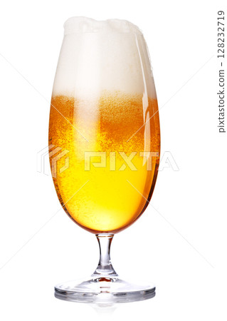 A glass of beer with a golden hue and frothy head, isolated on a clean white background 128232719