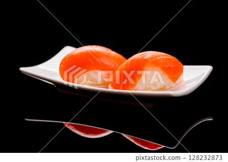 Salmon sushi beautifully arranged on plate Salmon sushi beautifully arranged on plate 128232873