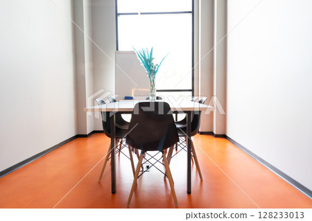 Interior of the hall with a table and a window for conferences 128233013