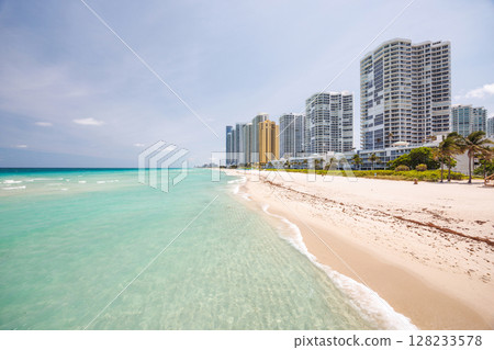 Modern skyline of Miami with towering skyscrapers, tropical vibe, and waterfront views Modern skyline of Miami with towering skyscrapers, tropical vibe, and waterfront views 128233578