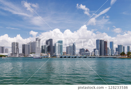 Modern skyline of Miami with towering skyscrapers, tropical vibe, and waterfront views Modern skyline of Miami with towering skyscrapers, tropical vibe, and waterfront views 128233586