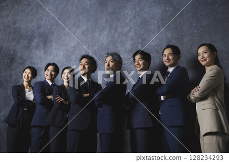 Businessman who plays guts pose Businessman who plays guts pose 128234293