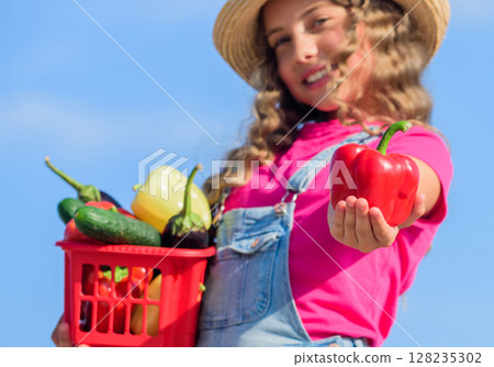 Best food. kid on summer farm. Organic food. happy little farmer. autumn harvest. harvest vitamin. spring market garden. little girl vegetable in basket. Only natural. healthy food for children Best food. kid on summer farm. Organic food. happy little farmer. autumn harvest. harvest vitamin. spring market garden. little girl vegetable in basket. Only natural. healthy food for children 128235302