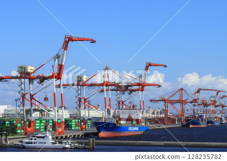 Container terminal at Tokyo Port Container terminal gantry cranes and cargo ships 128235782