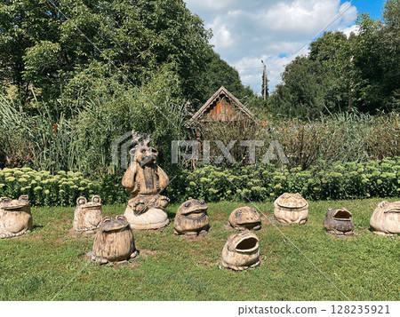 Unique pagan sculptures depicting frogs and mystical figures in Opishnia, Poltava, Ukraine 128235921