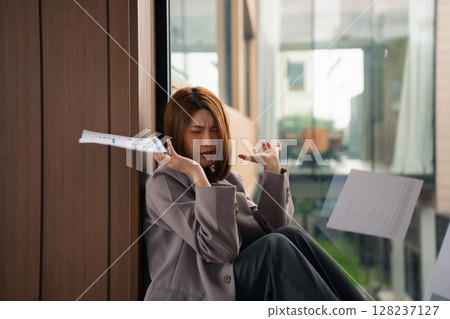 Stress businesswoman under stress from working. Stress businesswoman under stress from working. 128237127