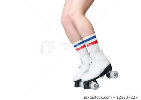 Caucasian female young wearing white roller skates and striped socks Caucasian female young wearing white roller skates and striped socks 128237227