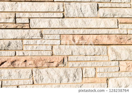 stone wall structure. stonewall background. Building material concept. Surface of stonewall. Textured backdrop. wall texture background 128238764