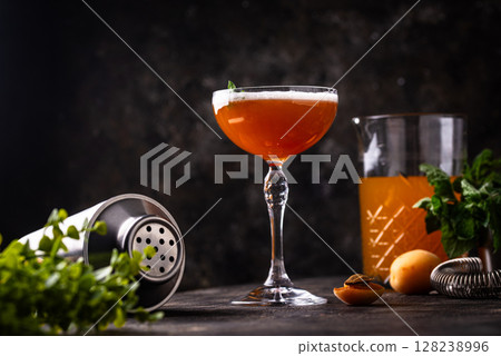 Fresh apricot cocktail martini with mint Fresh apricot cocktail martini with mint 128238996