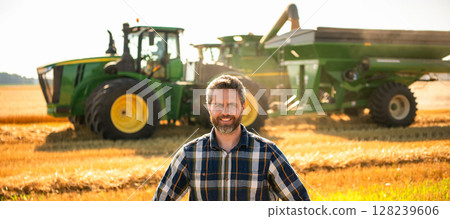 Agricultural wheat at harvest time. Countryside crop. Agronomist man at crop field. Ripe agriculture. Harvest man at field. Farmer agronomist. Crop harvest. Farmer check wheat. Experienced farmer 128239606