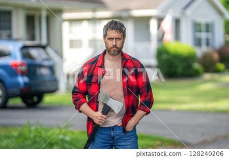 Handsome man with axe. Lumberjack at his house with ax. Lumberjack sweating hold heavy axe. Strong man work in neighborhood. Lumberjack men with axe. Lumberjack carries axe Handsome man with axe. Lumberjack at his house with ax. Lumberjack sweating hold heavy axe. Strong man work in neighborhood. Lumberjack men with axe. Lumberjack carries axe 128240206