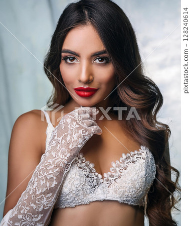 Elegant Woman in Lace Bralette and Gloves Elegant Woman in Lace Bralette and Gloves 128240614