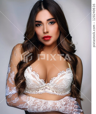 Elegant Woman in Lace Bralette and Gloves Elegant Woman in Lace Bralette and Gloves 128240616