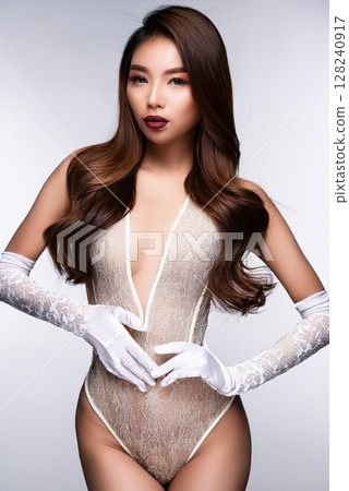 Gorgeous Woman in Elegant Lace Bodysuit 128240917