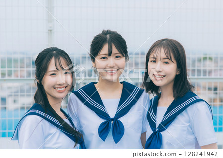 Three high school girls on the roof 128241942