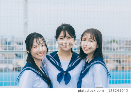 Three high school girls on the roof Three high school girls on the roof 128241943