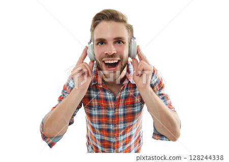 Generation z lifestyle. Happy man listening audio in music headphones. Caucasian man isolated on white. Student guy listen audio. Millennial man listen to music in headphones. Music concept Generation z lifestyle. Happy man listening audio in music headphones. Caucasian man isolated on white. Student guy listen audio. Millennial man listen to music in headphones. Music concept 128244338