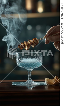 A smoky grilled skewer hovers over a crystal cocktail glass, blending gourmet presentation with artisanal mixology in a moody bar setting 128245039