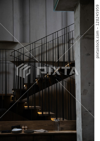 An Elegant Modern Staircase beautifully designed within a Minimalist Interior space 128245959