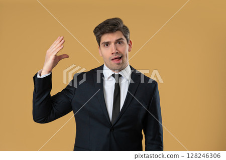 Irritated Mature Businessman Showing Bla-Bla Gesture With Hands, Rolling Eyes Irritated Mature Businessman Showing Bla-Bla Gesture With Hands, Rolling Eyes 128246306