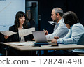 VC Fund board members brainstorming and discussing startup investment results in business meeting 128246498