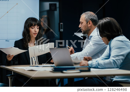 VC Fund board members brainstorming and discussing startup investment results in business meeting VC Fund board members brainstorming and discussing startup investment results in business meeting 128246498