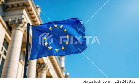 European Union flag waving against clear blue sky 128246932