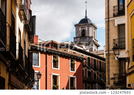 Charming architecture in Madrid, with a view of historic buildings and a church tower. Charming architecture in Madrid, with a view of historic buildings and a church tower. 128247693