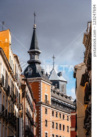 A view of Madrid's historic architecture and city streets, showcasing the city's landmark buildings. A view of Madrid's historic architecture and city streets, showcasing the city's landmark buildings. 128247694