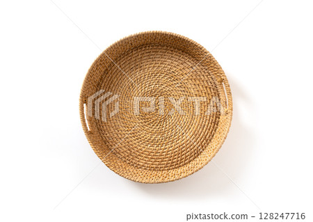 Wicker woven bamboo tray isolated on white background. Handmade by local craftsmen in sri lanka traditional tableware. View from above. 128247716