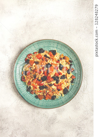 rice dish with dried fruits, nuts and spices of Middle Eastern cuisine, homemade, no people, rice dish with dried fruits, nuts and spices of Middle Eastern cuisine, homemade, no people, 128248279