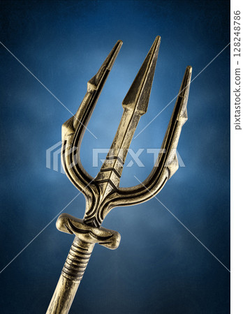 Golden trident over blue misty background Golden trident over blue misty background 128248786