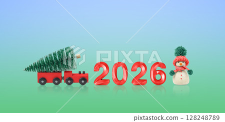 New Year 2026. Christmas card with a red train with a Christmas tree, a snowman, and the number 2026 on a blue and green background. Concept of a happy holiday. A fabulous postcard New Year 2026. Christmas card with a red train with a Christmas tree, a snowman, and the number 2026 on a blue and green background. Concept of a happy holiday. A fabulous postcard 128248789