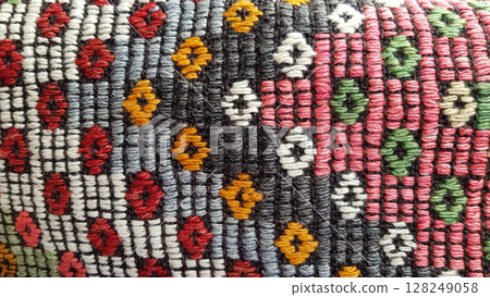 Weave texture of traditional Turkish ethnic pattern carpet closeup Weave texture of traditional Turkish ethnic pattern carpet closeup 128249058