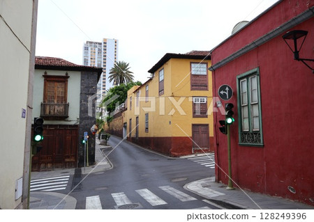 Charming European Street Intersection with Colorful Buildings and Vintage Traffic Lights on Tenerife Charming European Street Intersection with Colorful Buildings and Vintage Traffic Lights on Tenerife 128249396