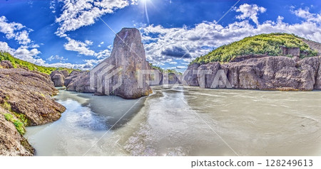 Majestic Icelandic landscape with dramatic mountains and cloudy sky Majestic Icelandic landscape with dramatic mountains and cloudy sky 128249613