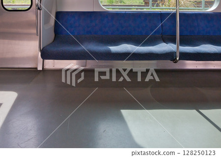 Car seat door Musashino Line 205 series rapid train Kitafuchu Station platform 128250123