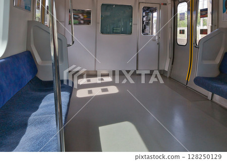 Car seat door Musashino Line 205 series rapid train Kitafuchu Station platform 128250129