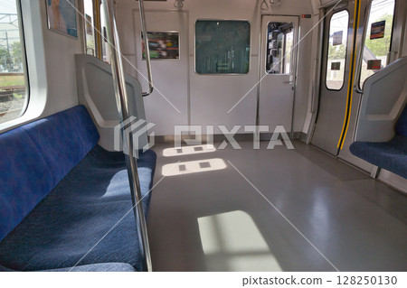 Car seat door Musashino Line 205 series rapid train Kitafuchu Station platform 128250130