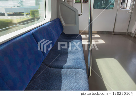 Car seat door Musashino Line 205 series rapid train Kitafuchu Station platform 128250164