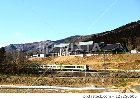 Roadside station Tono Kaze no Oka and the Kamaishi Line as seen from the rice paddy fields of Tono 128250606