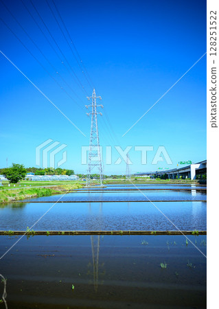 Ken-o Expressway and rice fields 128251522