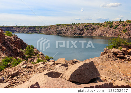 View of the lake at abandoned quarry on summer View of the lake at abandoned quarry on summer 128252427