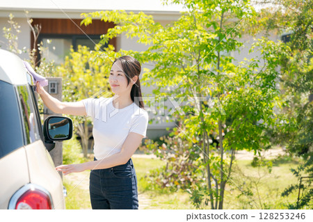 Woman cleaning the car 128253246