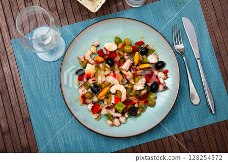Popular Spanish Salpicon from vegetables and seafood mix Popular Spanish Salpicon from vegetables and seafood mix 128254572