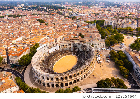 Aerial view of ancient French city of Nimes overlooking antique Arena Aerial view of ancient French city of Nimes overlooking antique Arena 128254604