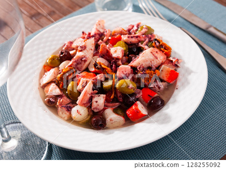 Delicious salad from variety of seafood with chopped vegetables (Salpicon de mariscos) typical for Spanish cuisine Delicious salad from variety of seafood with chopped vegetables (Salpicon de mariscos) typical for Spanish cuisine 128255092