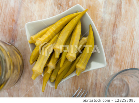 Homemade organic marinated pickled okra 128255093