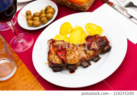 Just prepared honey glazed beef ribs with potato Just prepared honey glazed beef ribs with potato 128255289